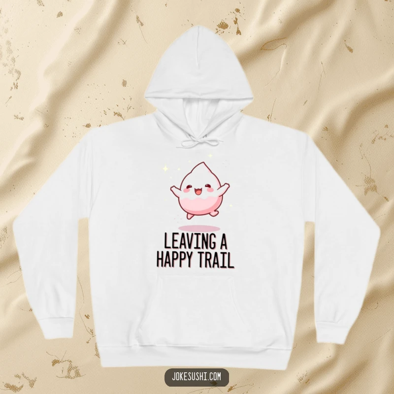 Funny hoodie depicting a playful mochi character joyfully bouncing with a trail of sparkling dust, offering warmth and cheer.