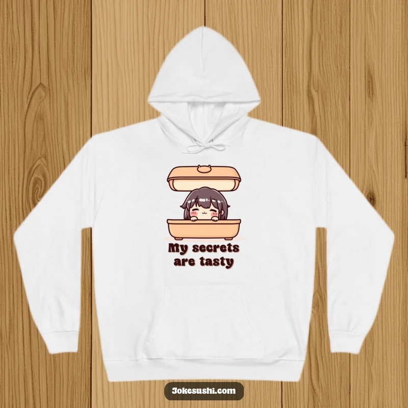 Funny hoodie depicting a shy, blushing bento box character peeking out from under its lid, cozy and cute.
