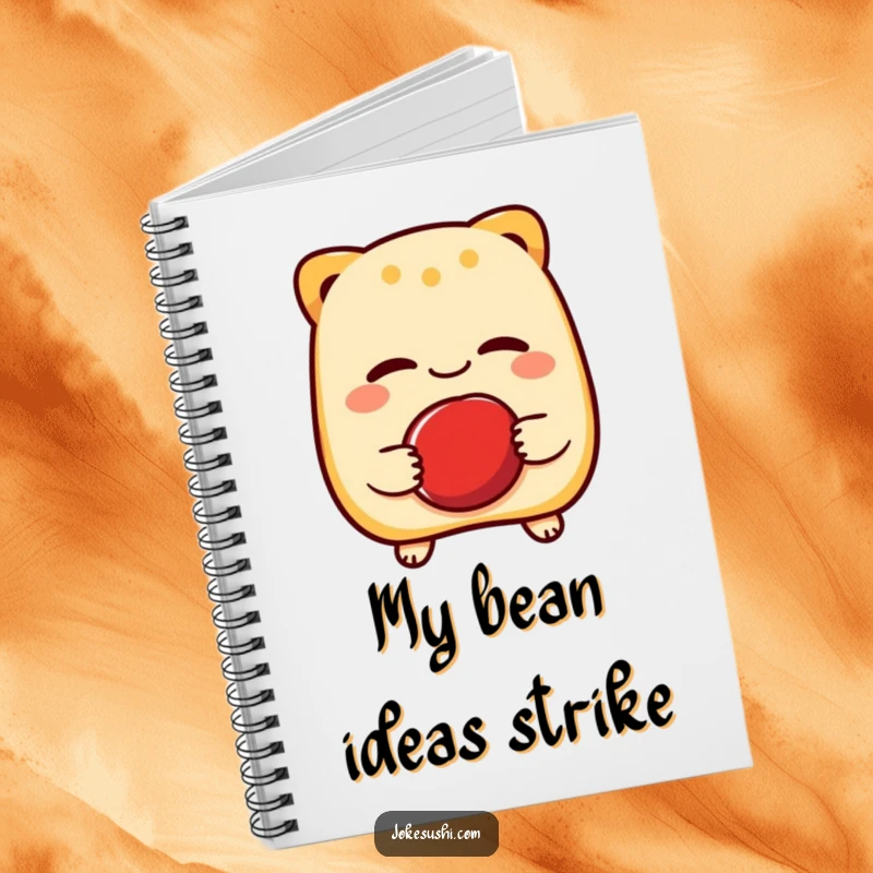 Funny notebook with a cheerful taiyaki character winking while holding a red bean, ideal for jotting down ideas with a touch of cartoon sweetness.