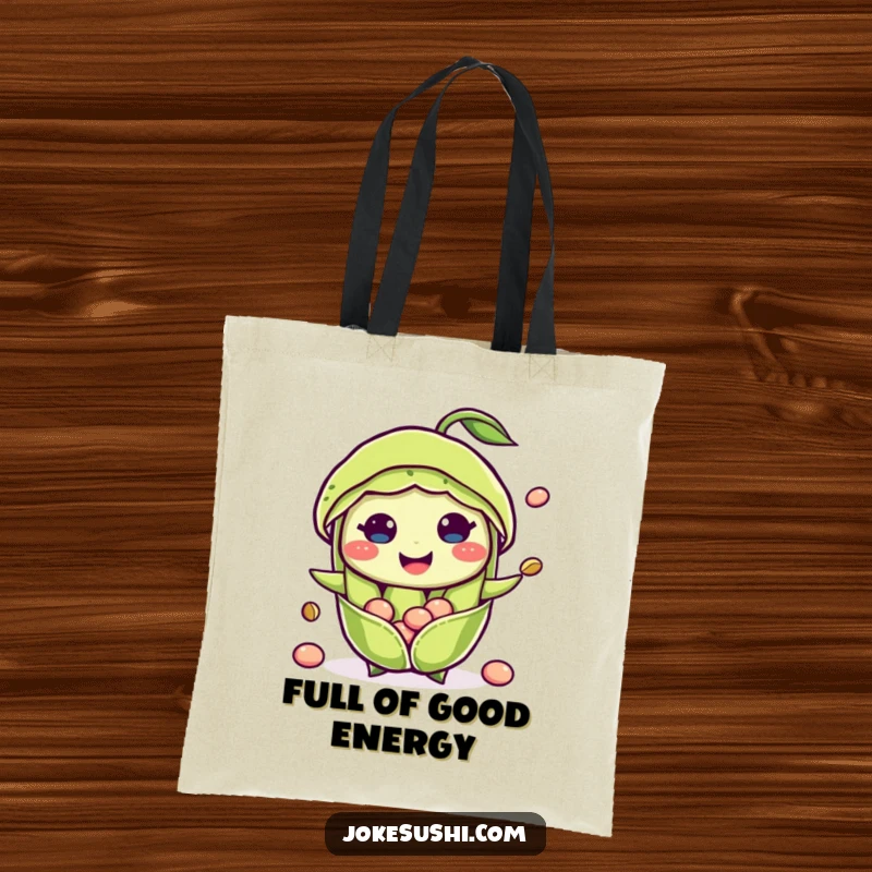 Funny tote bag featuring a smiling edamame pod with beans popping out, perfect for carrying groceries and spreading healthy cheer.